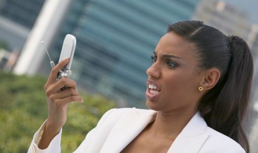 black-woman-looking-at-cell-phone.jpg